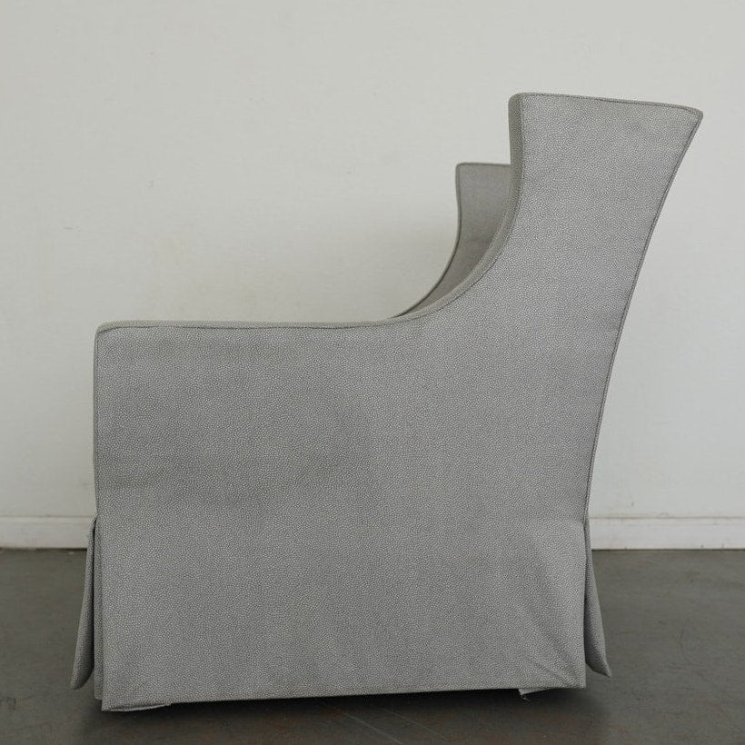 Upholstered Swivel Armchair & Ottoman